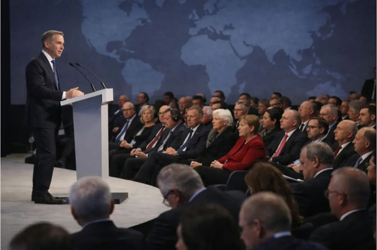 Mark Carney speaking at the World Economic Forum in Davos before an audience of global leaders.