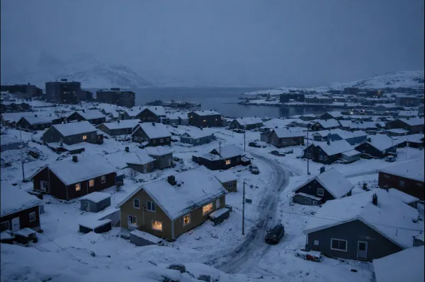 Winter view of Nuuk, Greenland during a power outage, showing residential buildings affected by an electricity blackout in the Arctic capital.