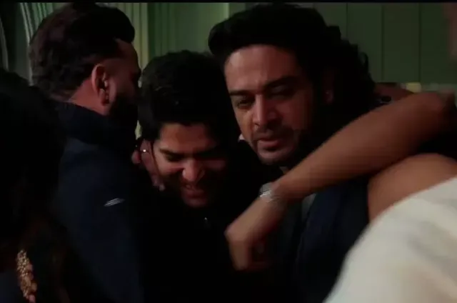 Bigg Boss 19 contestants share an emotional hug during an intense moment inside the house.